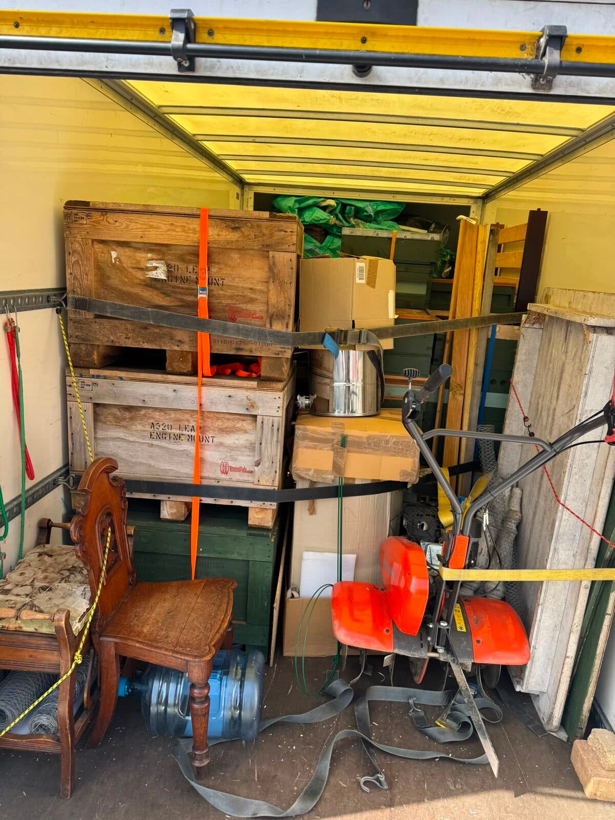 Luton van being loaded with furniture during a house removal