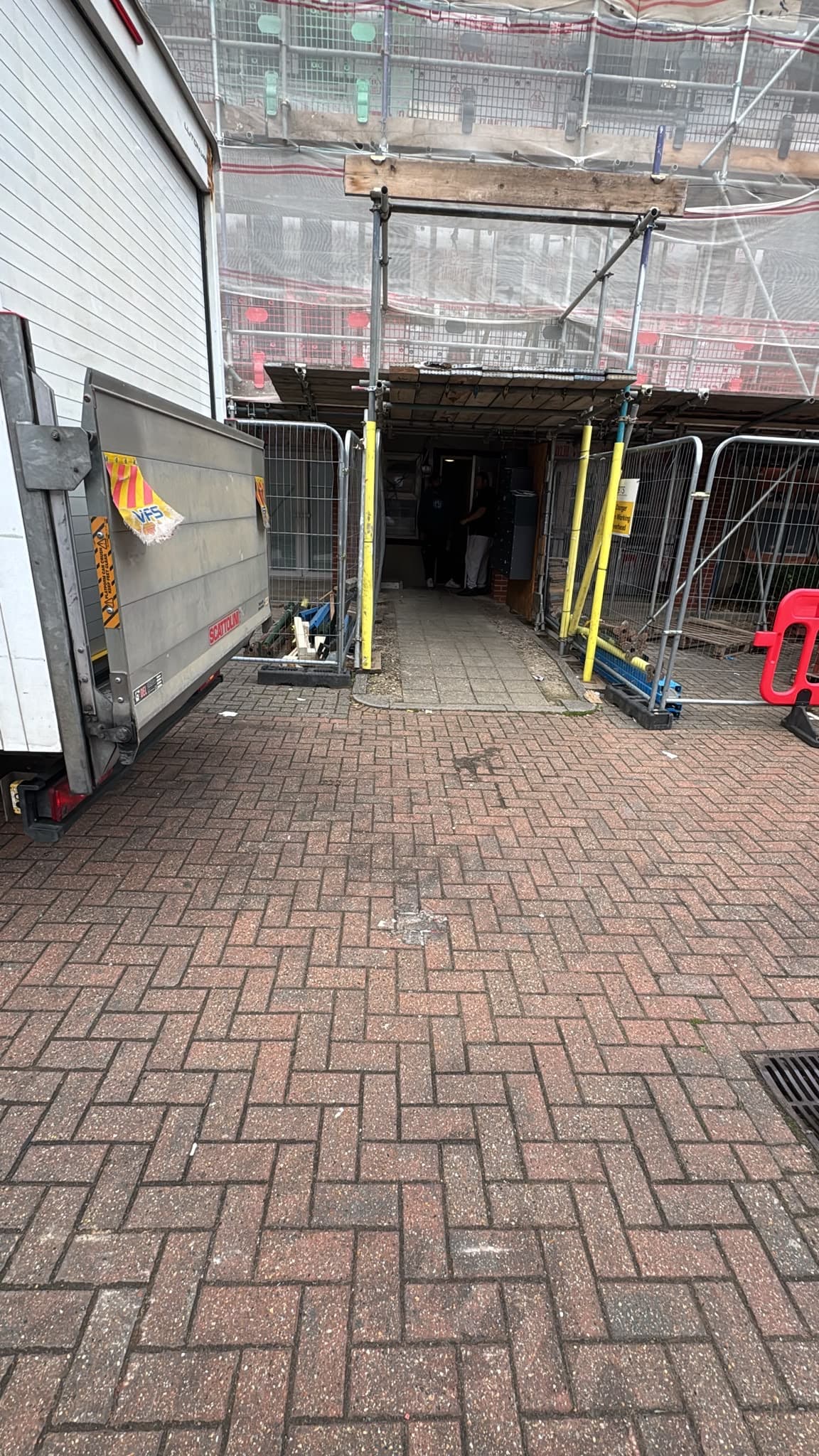 RayMovals two-man Luton van with tail lift at the flat entrance on the first Stevenage move