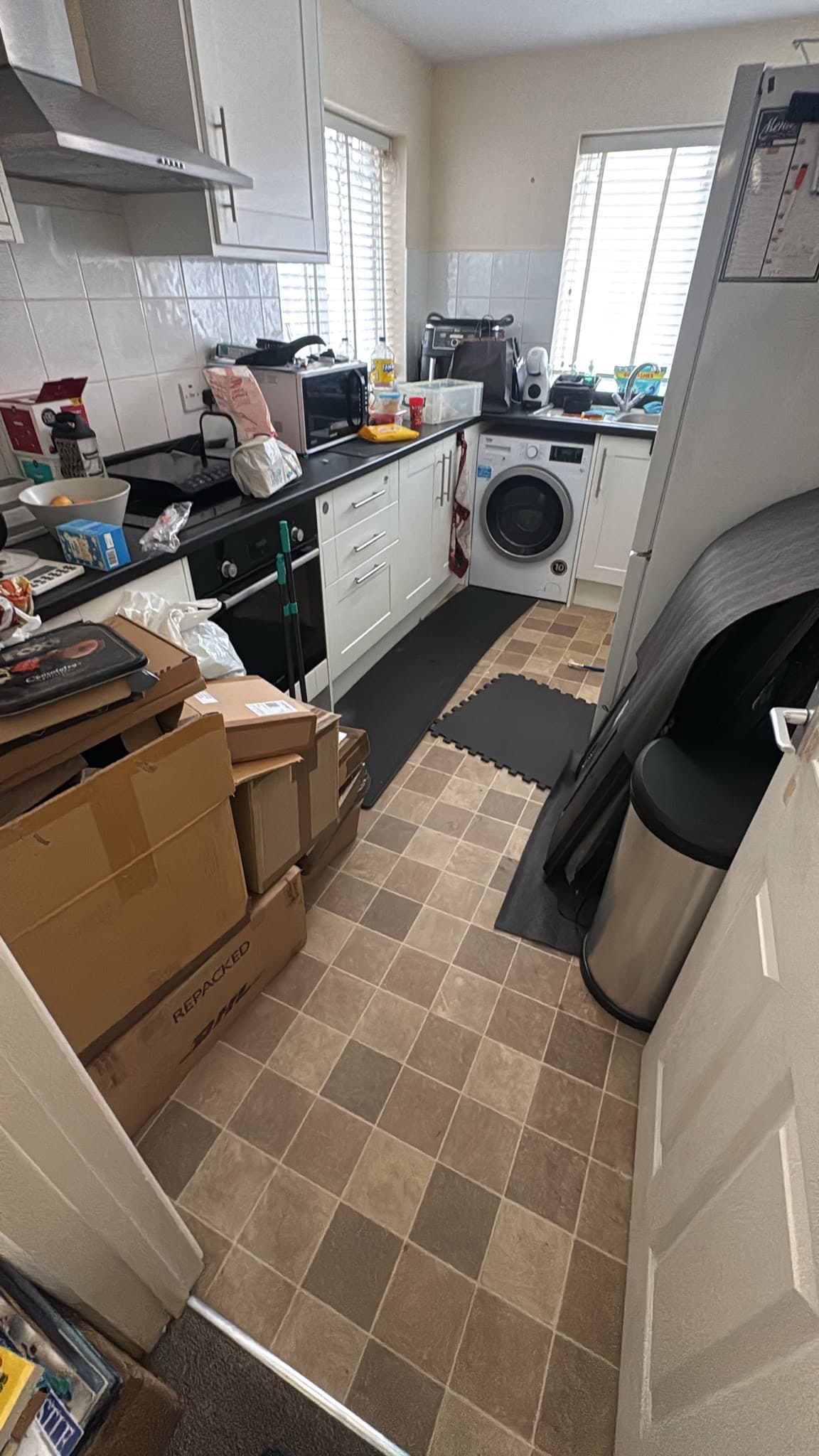 Kitchen boxes packed ready for collection during the Stevenage move