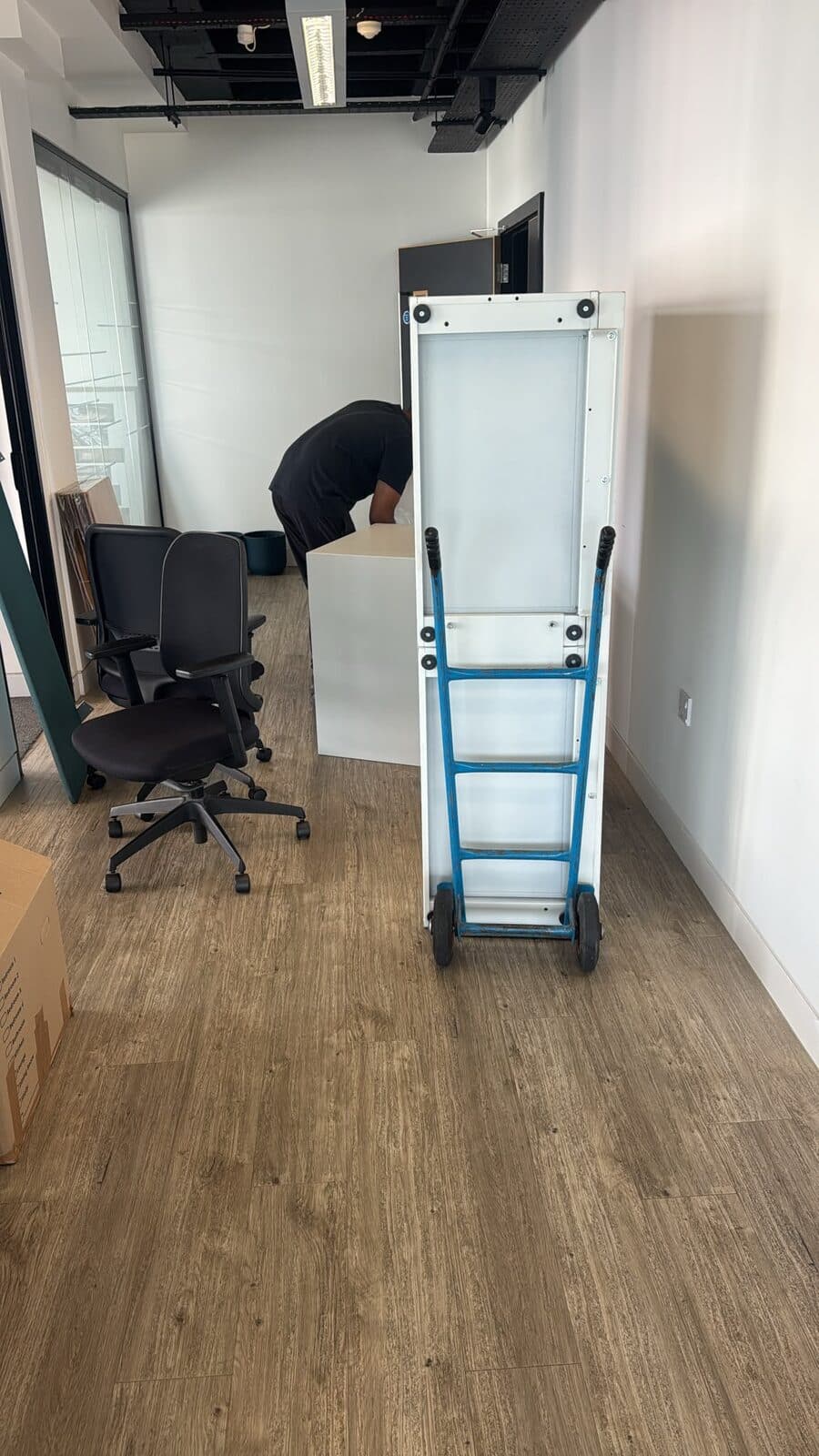 Furniture lowered and loaded onto the tail lift during the Harrow move