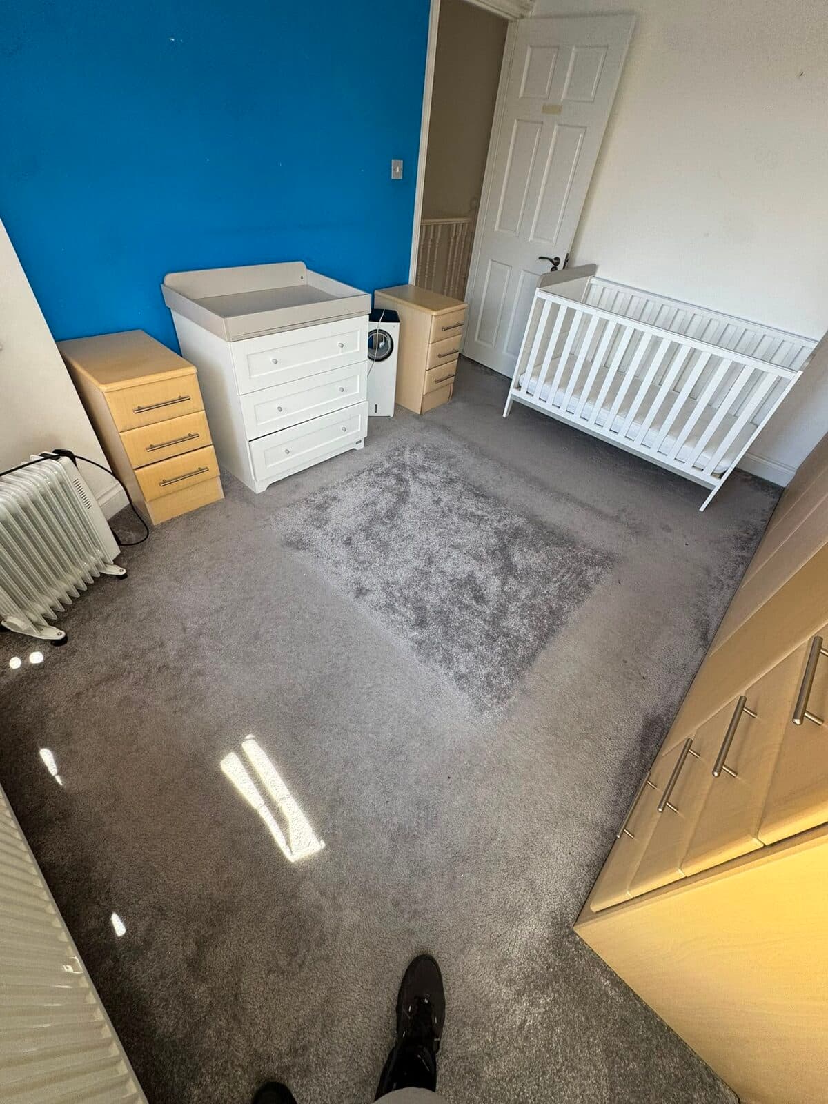 Nursery furniture and cot ready to be dismantled and moved to the new Richmond home