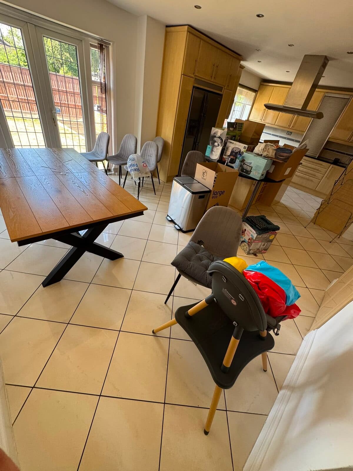 Kitchen and dining area being cleared during the Stanmore to Harrow house removal