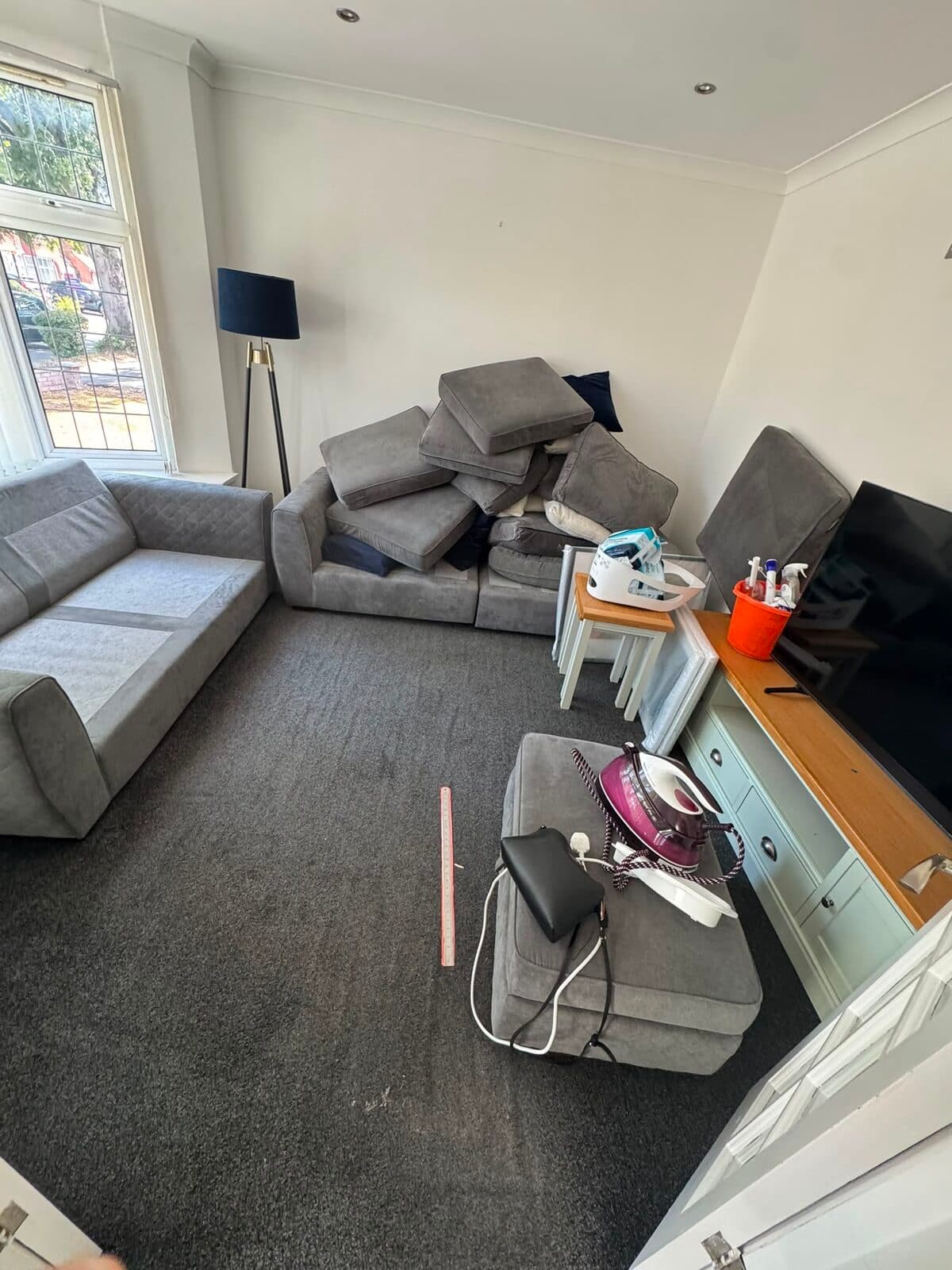 Corner sofa broken down into sections ready to carry out during the Luton move