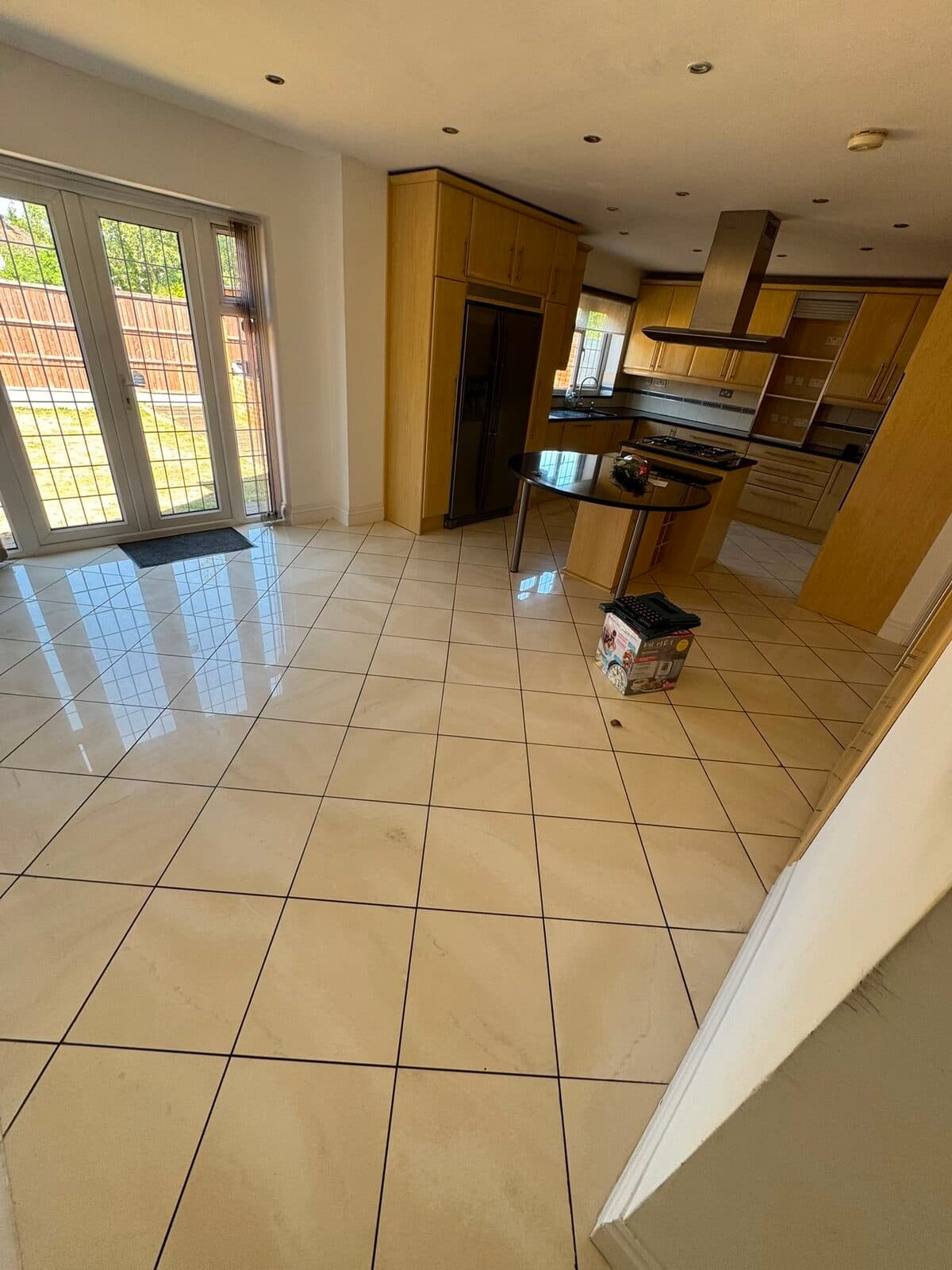 Kitchen cleared to the tiles at the Harrow property during the house move