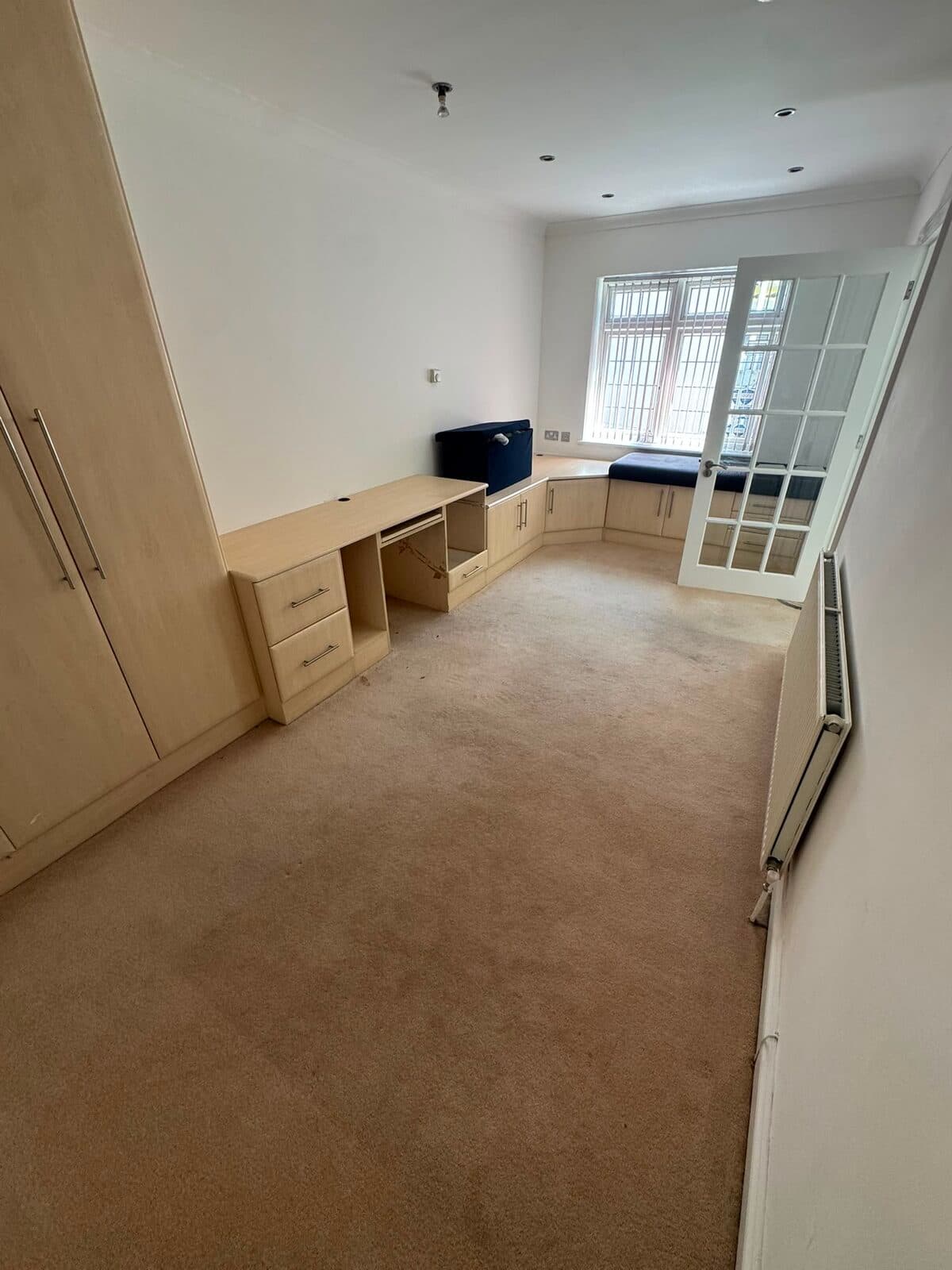 Study cleared and fitted furniture emptied at the property during the Harrow house move
