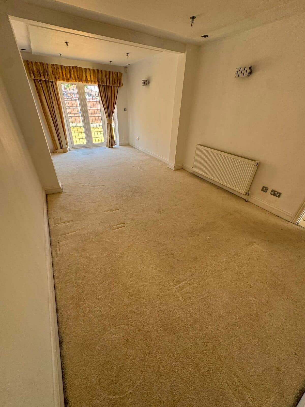 Through-lounge emptied and ready for handover after the Stanmore to Harrow move