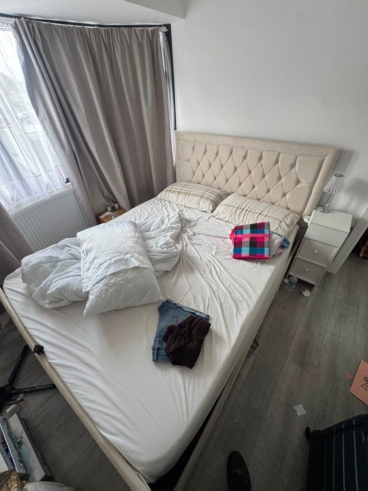 Double bed stripped and bed frame broken down ahead of the move from Uxbridge to Enfield