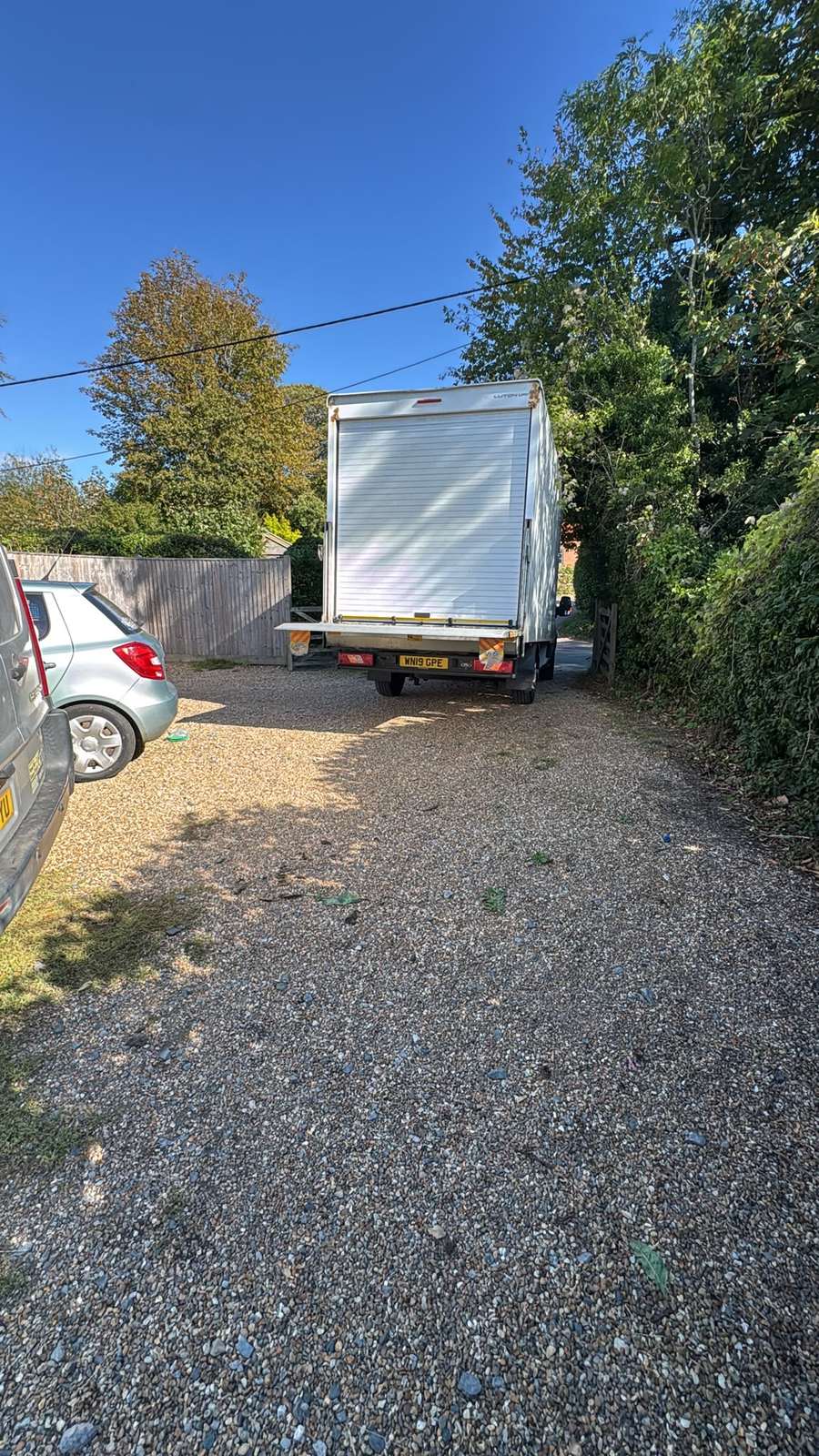 RayMovals Luton van parked on a gravel drive at a rural property during the Leighton Buzzard to Sussex house move