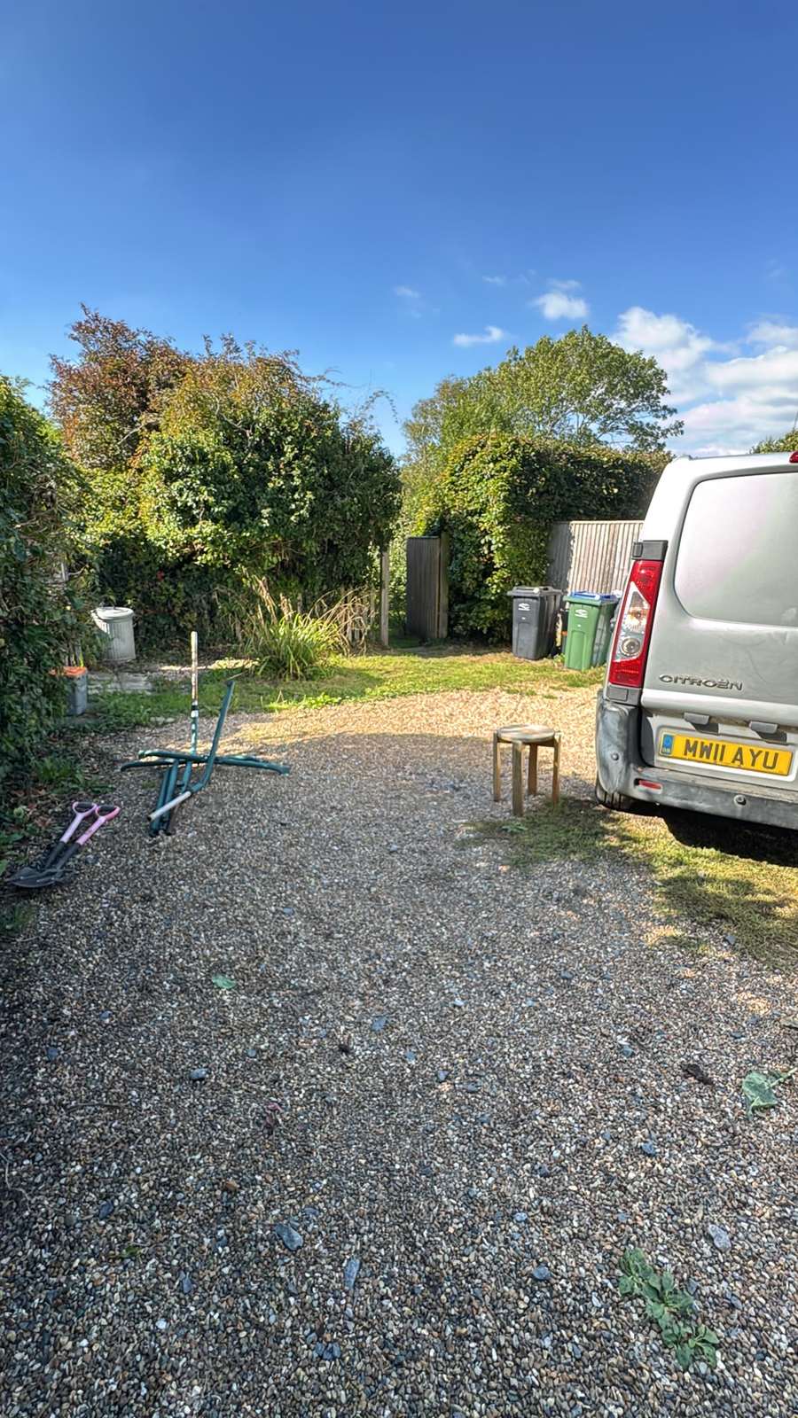 Van on the gravel drive, with the lane and hedging that made the approach tight