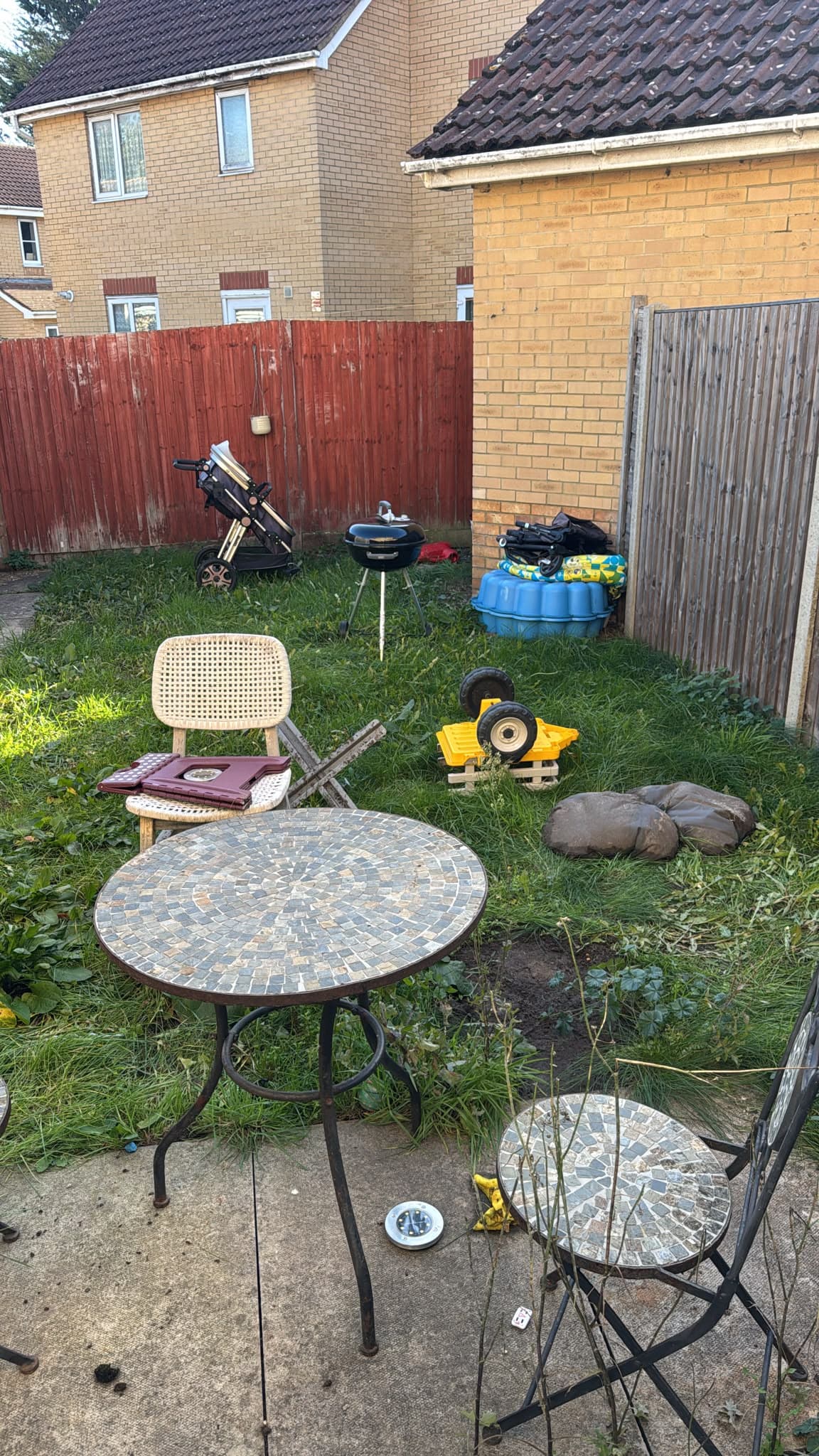 Garden furniture and outdoor items collected from the rear garden as part of the full house move