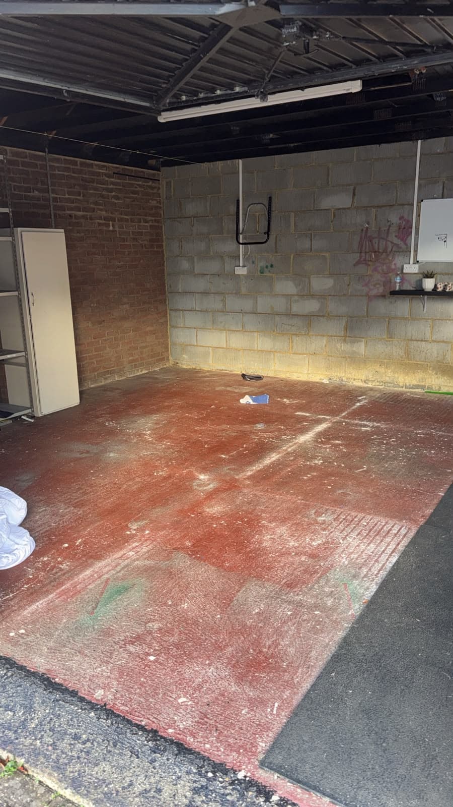 Empty garage at the Gamlingay property before furniture was moved in