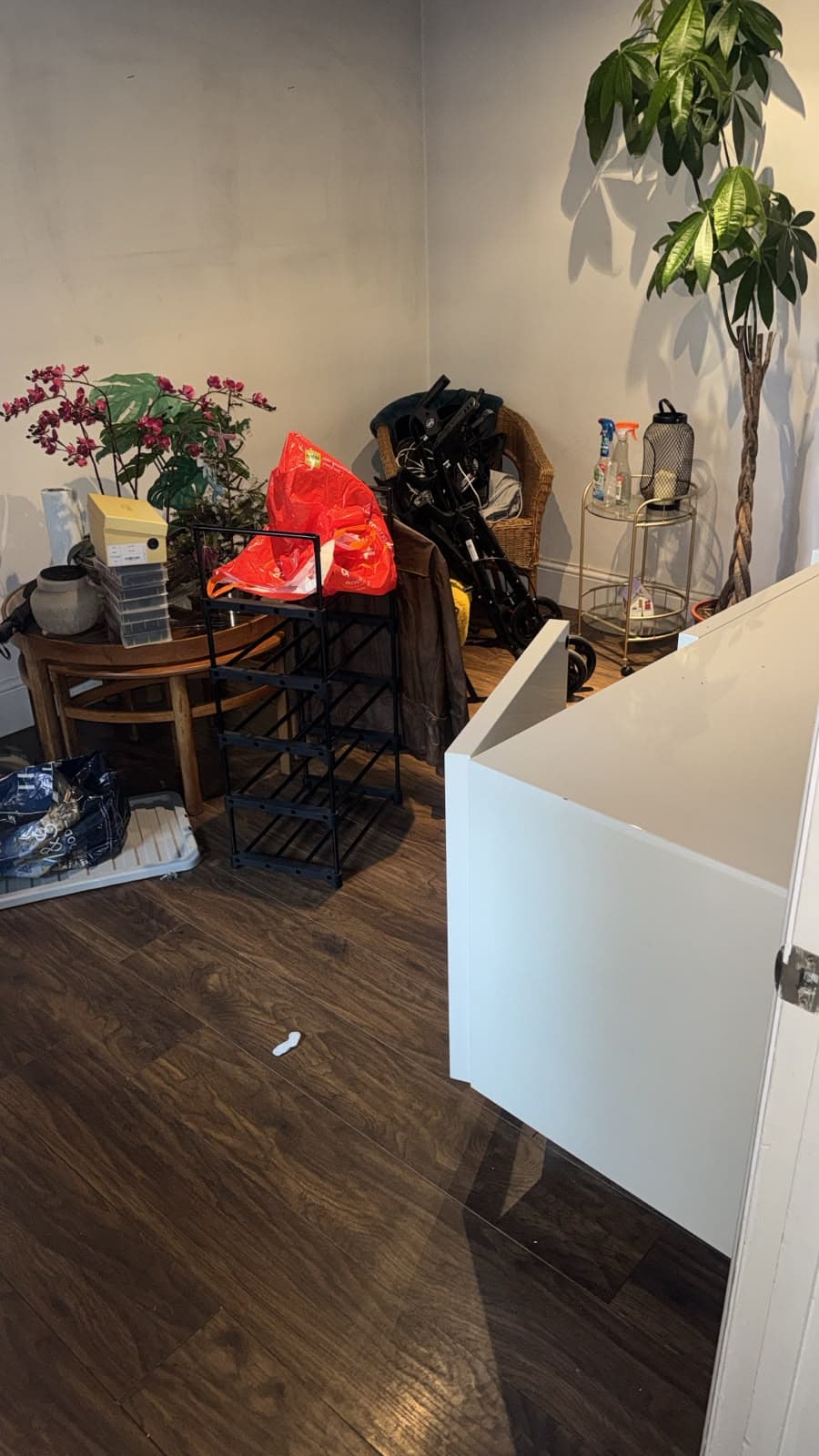 Furniture carried in and placed in position at the new home during a downsizing move