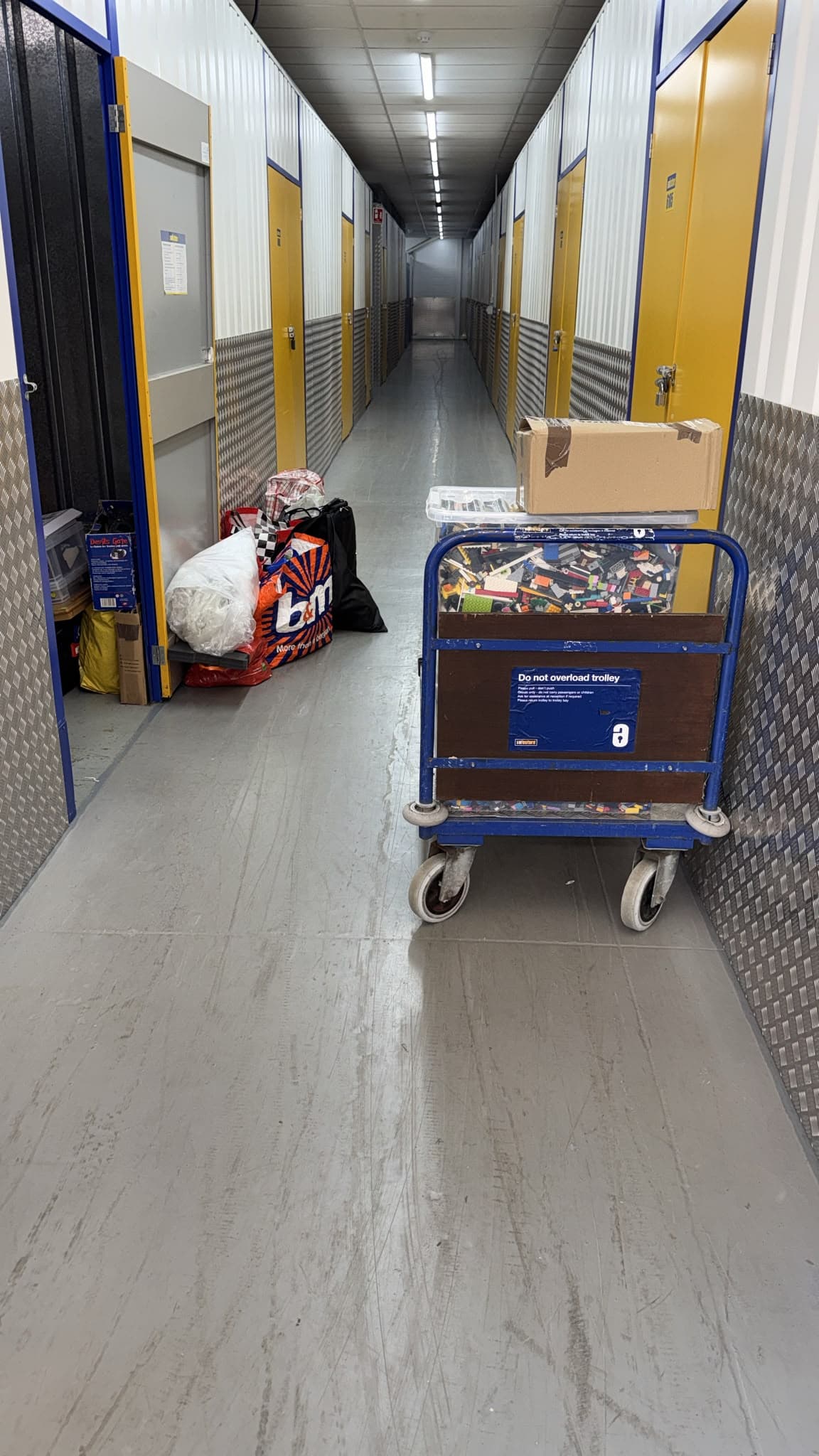 Loaded trolley at the Safestore storage unit in Stevenage as belongings are moved in